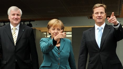 Merkel's new coalition hammers out final issues