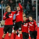 Kroos double shoots Leverkusen back to top spot