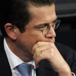 Pressure mounts on Guttenberg over air strike