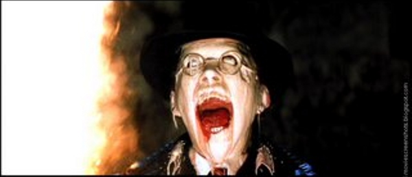 Major Arnold Toht (Raiders of the Lost Ark)<br>Melty faces are all the rage in Hollywood these days, but when Ronald Lacey had his clock cooked in 1981’s <i>Raiders of the Lost Ark</i>, it was still considered mildly horrifying. Lacey was playing evil Gestapo agent Arnold Toht. Spielberg originally wanted Toht to be a cyborg, but George Lucas felt this would be unrealistic. Lucas voiced no such objections to the character being liquefied by the spirits of Ra.Photo: Lucasfilm & Paramount Pictures via moviescreenshots.blogspot.de