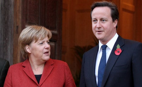 Merkel visits Cameron for EU talks