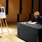 Merkel under fire for missing Mandela tribute