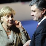 Chancellor Angela Merkel speaks with Ukrainian President Poroschenko at this week's Nato summit in Wales, which saw the alliance agree measures to deter Russian agression in Eastern Europe.Photo: Photo: DPA