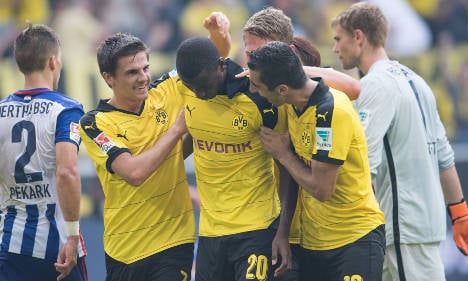 Dortmund reclaim top spot with Hertha win