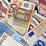 Woman throws away 1000s of euros in cash