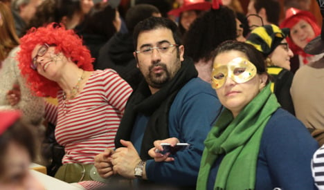 Cologne locals take refugees under their wing for Karneval