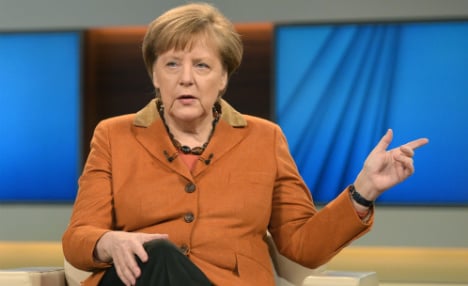 ‘I will do my damn duty’ on refugees, says Merkel