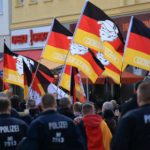 Far-right radicals try to storm east German police station