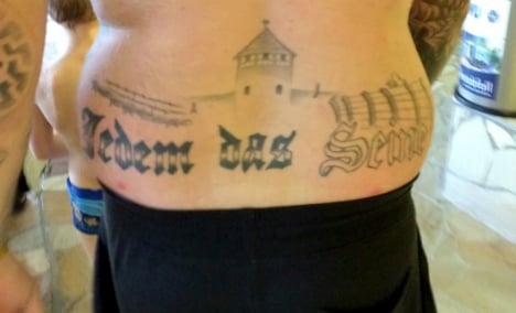 German politician jailed for Nazi death camp tattoo
