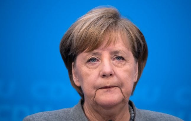 Merkel, SPD set January deadline for next phase of government talks