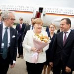 Merkel arrives in Russia for talks with Putin about Iran, Ukraine and energy