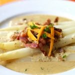 Recipe: White asparagus with speck in orange chervil cream sauce