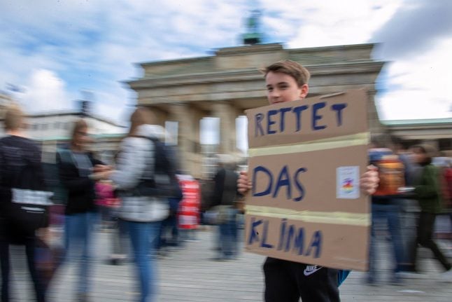 UPDATE: Germany reaches climate deal as protesters strike for change