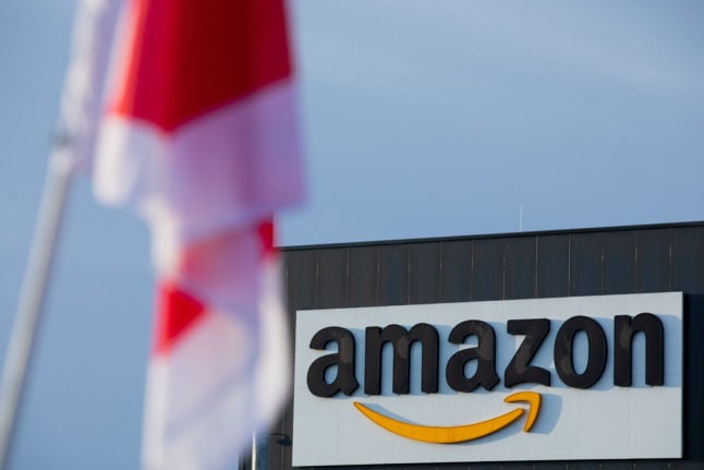 Amazon workers across Germany go on strike for higher wages in build up to ‘online Xmas’
