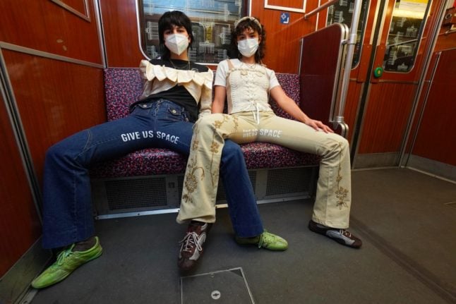 Berlin activists show manspreaders who wears the trousers