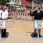 POLITICS: Frontrunner to succeed Merkel as chancellor on back foot after flood disaster