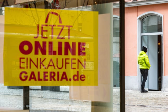A Galeria Kaufhof sign says "Shop Online Now"