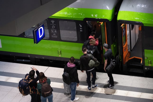 Passengers board a FlixTrain service in Berlin