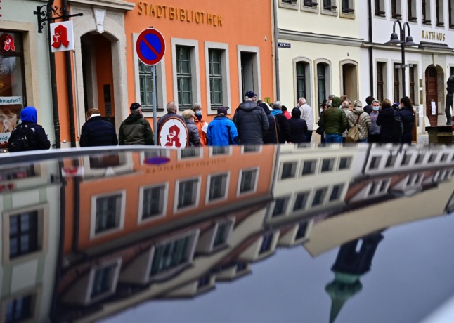 People queue at a vaccination centre in Radeberg, Saxony.