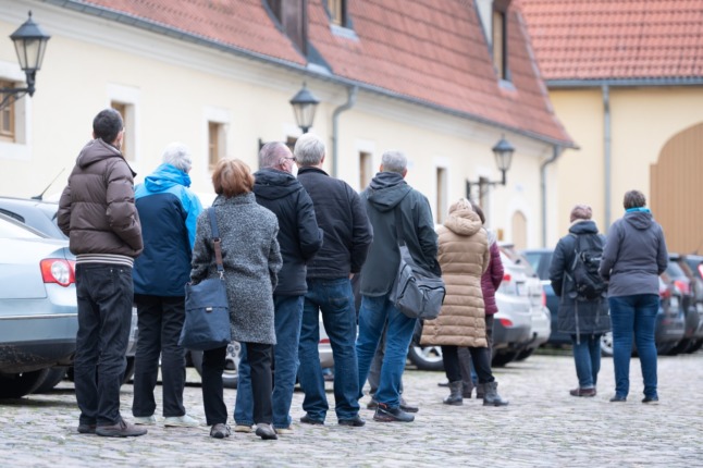 People queuing to get a vaccination in Staucha, Saxony. 
