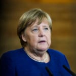 Merkel gives stark warning as Germany's Covid death toll tops 100,000