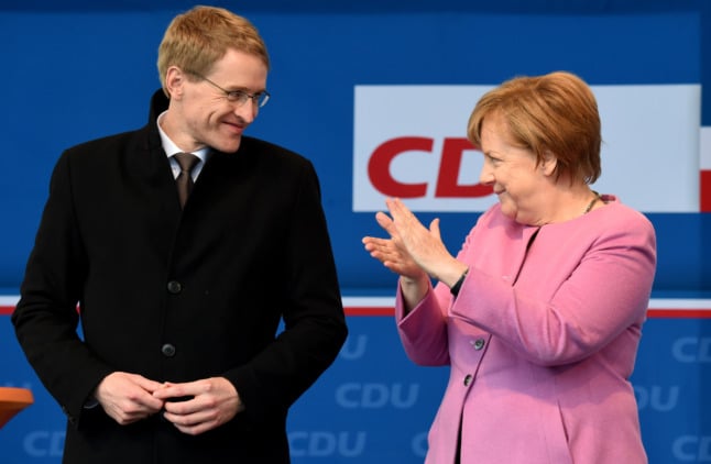 Angela Merkel and Daniel Günther