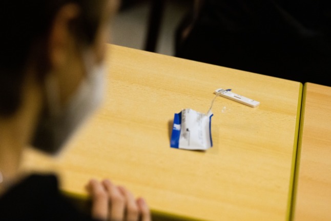 A young person with a Covid test at a school in Germany.