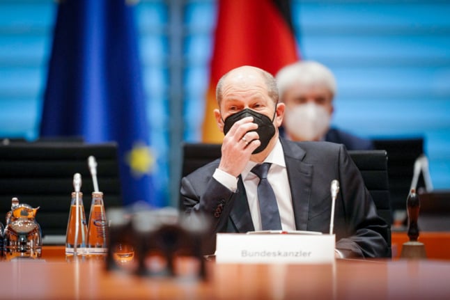 Olaf Scholz attends a meeting at the chancellery